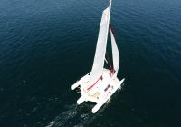 bird view of trimaran yacht sailing